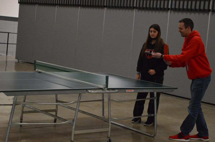 Kailey Alexander (8) and Thuenemann pair up for his Ping Pong club on Jan. 20.