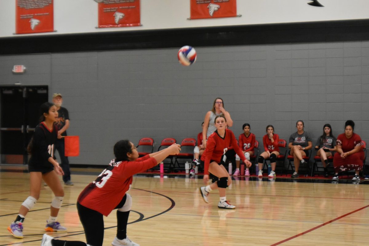 Mia Niederhauser passes the ball to the setter as Payton Heman and Sojay Sinthusy watch in a game against Campbell Middle School on Sept. 25. OTMS lost in three sets: 25-15, 19-25, 14-16.