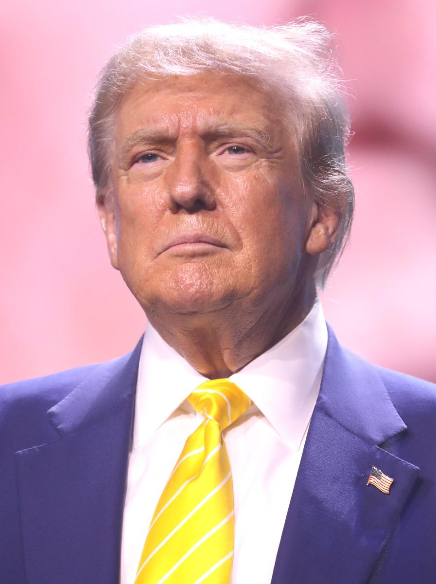 Donald Trump speaking with attendees at a "Chase the Vote" rally at Dream City Church in Phoenix, Arizona.