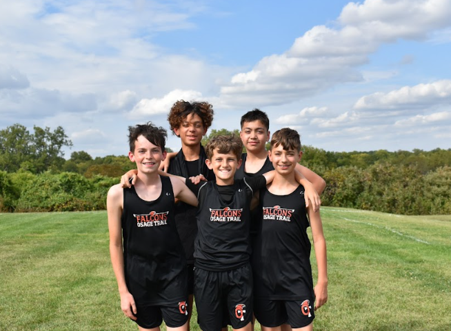 Boys from the cross country team pose during the OTMS Invitational meet on Sept. 18.